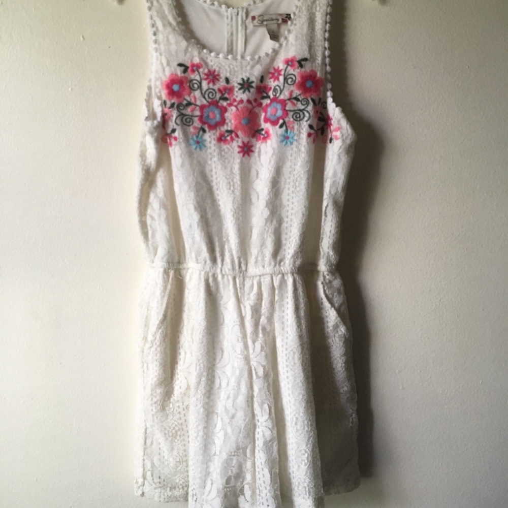 off-white with floral design romper